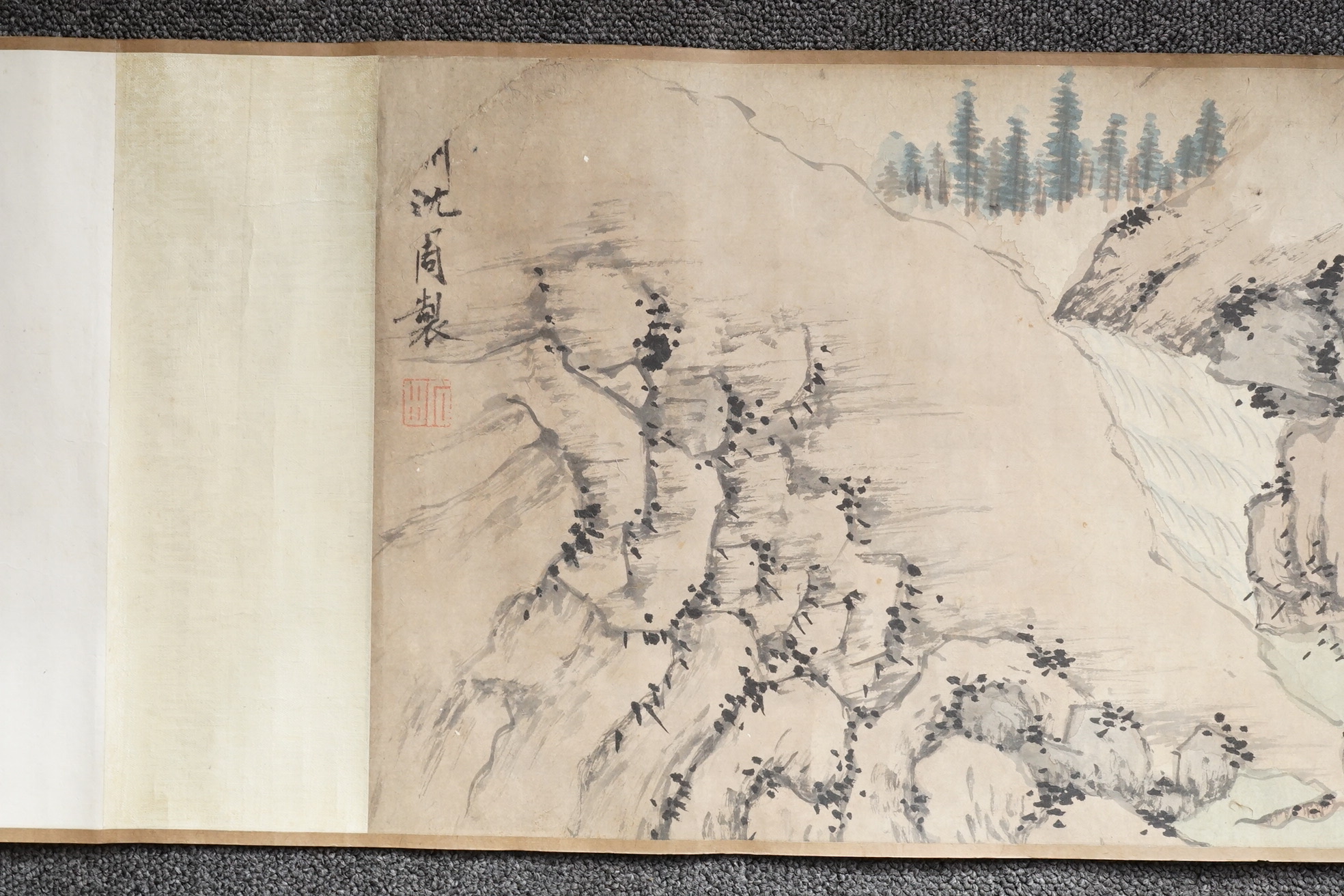 Chinese School , (Qing dynasty), Figures in a mountainous river landscape, Ink and colour on paper handscroll, 268.5cm x 29cm excluding borders